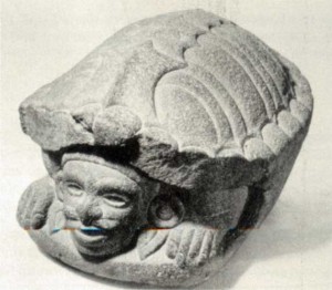 Fig.17 Stone figure representing the god Macuilxochitl, or 5 Flower, inside the mouth of a turtle. From Mixtequilla, Veracruz. National Museum of Anthropology, Mexico.